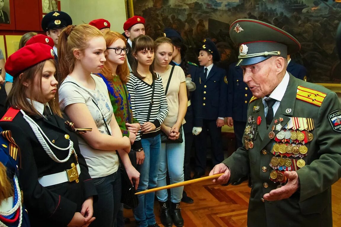 Учитель участник сво. Встреча с ветеранами в школе. Школьники и ветераны. Встреча детей с ветеранами. Ветераны ВОВ И школьники.