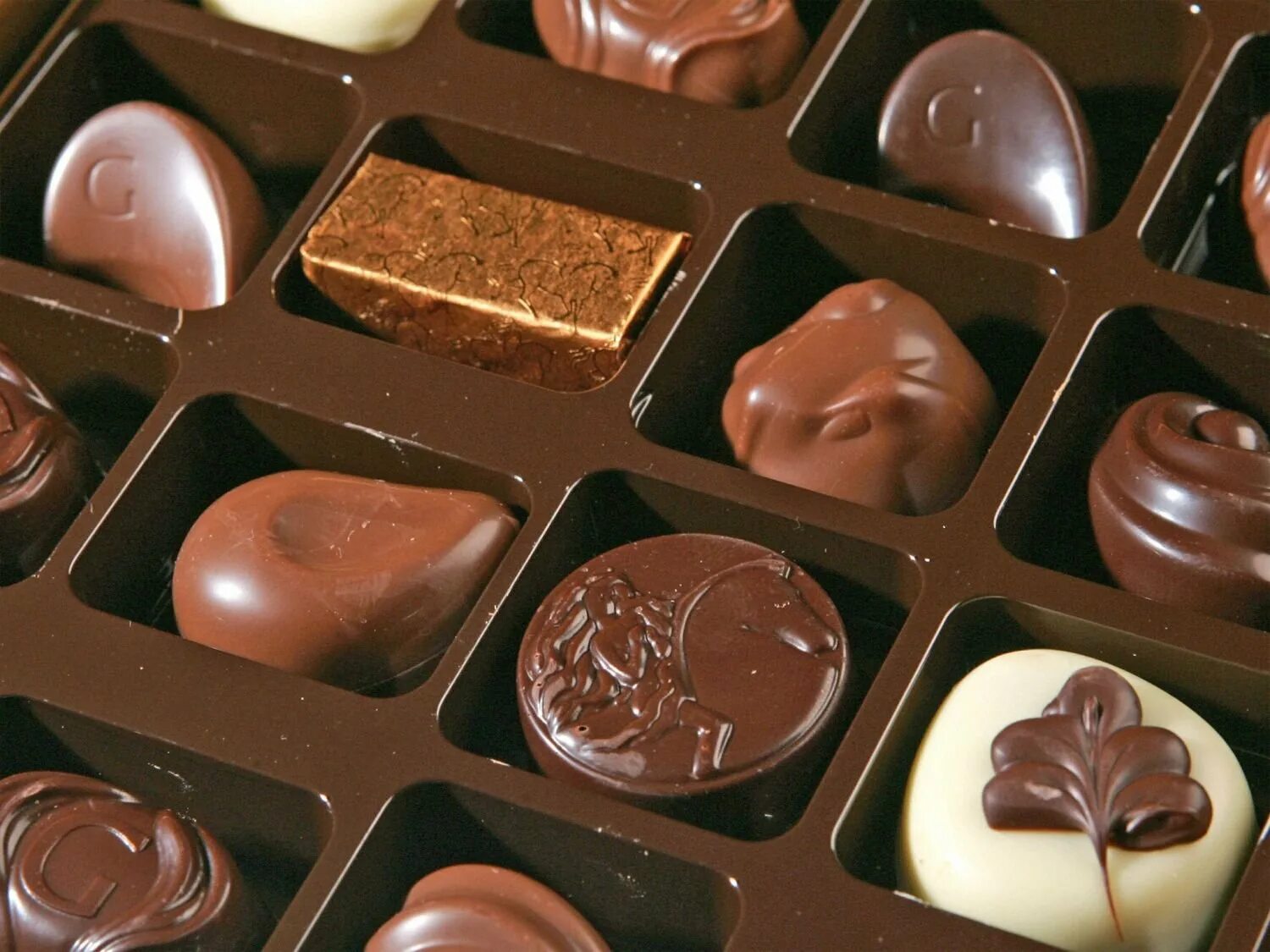 Лучший бельгийский шоколад. Пралине (бельгийский шоколад). Шоколад пралине Бельгия. Конфеты бельгийский шоколад. Шоколад картинки красивые.