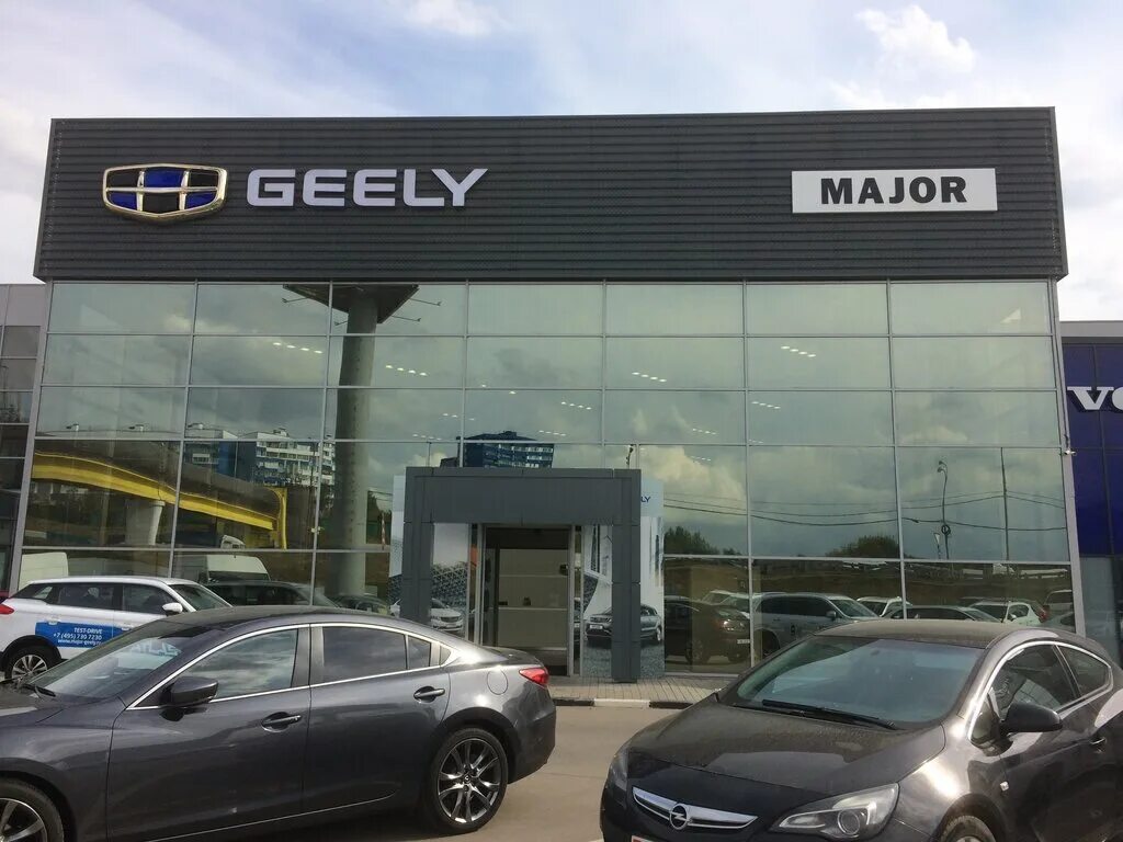 Джили дмитровка. Дц джили. Джили дмитровка. Geely автосалон. Джили дмитровка.
