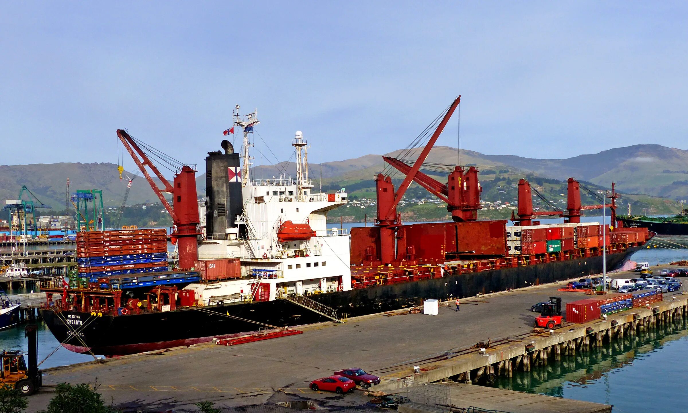 Cargo vessel. Грузовой порт Донхэ. Грузовой порт Хошимин. Китайские портовые тягачи. Грузовой порт Тиват.