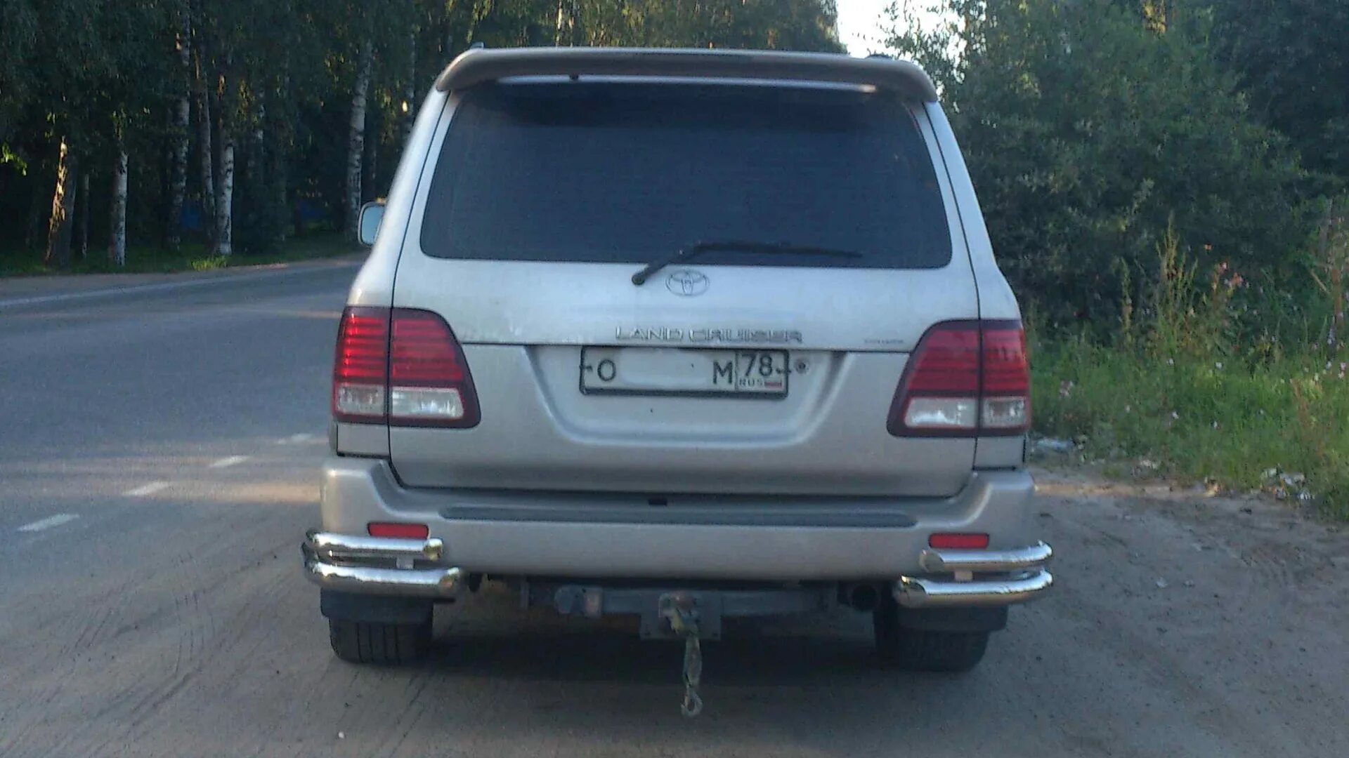 Бампер задний ленд крузер 100. Toyota land cruiser 100 сзади. защита заднего бампера крузак 100. защита заднего бампера лэнд крузер 100. тойота ленд крузер 100 вид сзади.