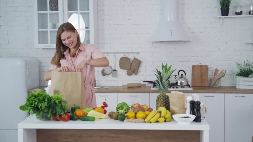 Woman Apple Kitchen. That the housewife is preparing the Fruit. Been preparing