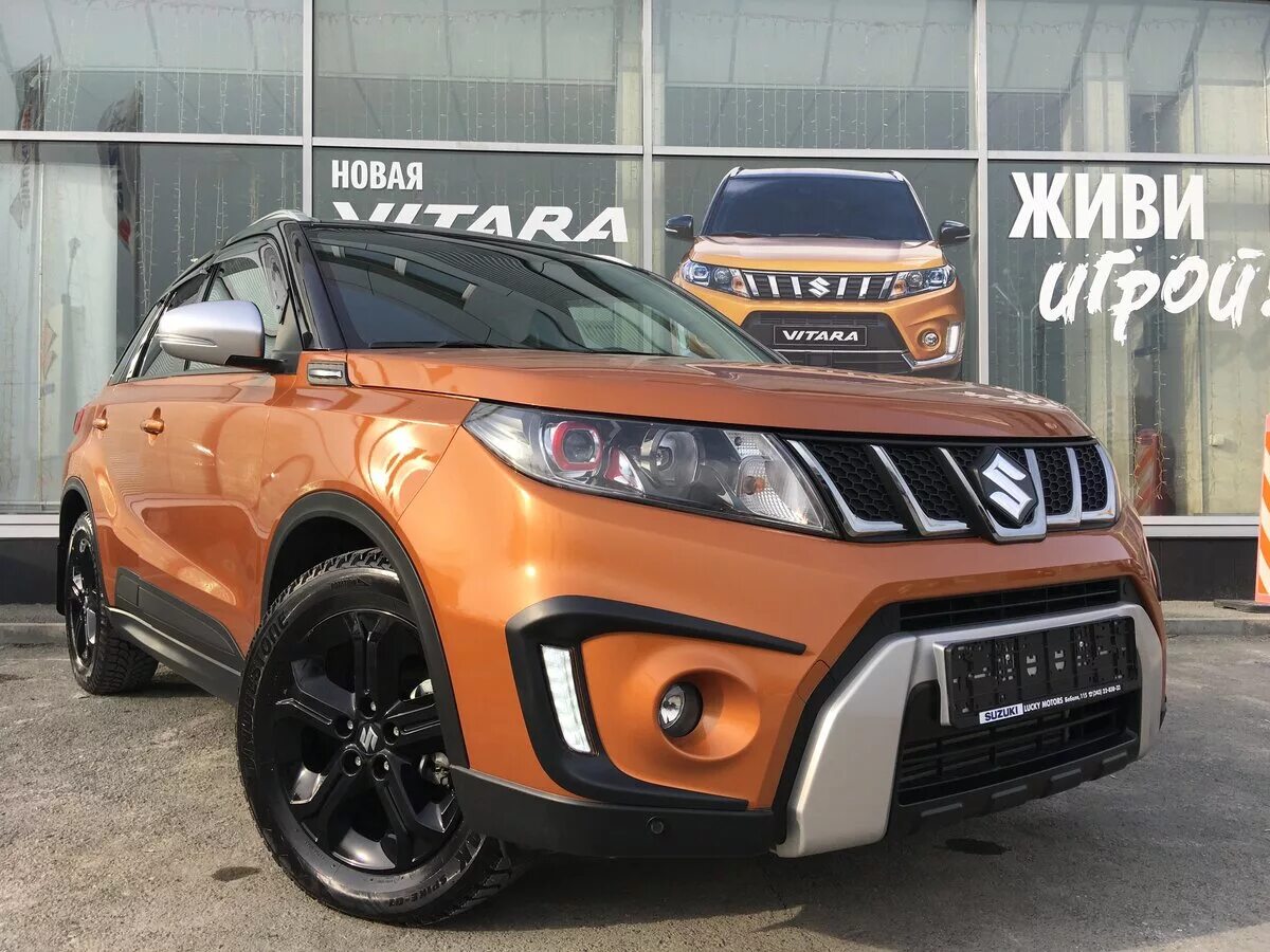 Suzuki vitara б у. Suzuki Vitara 2015 оранжевая. Suzuki Grand Vitara оранжевая. Suzuki Grand Vitara оранжевый 2012. Сузуки Витара оранжевая с черной крышей.