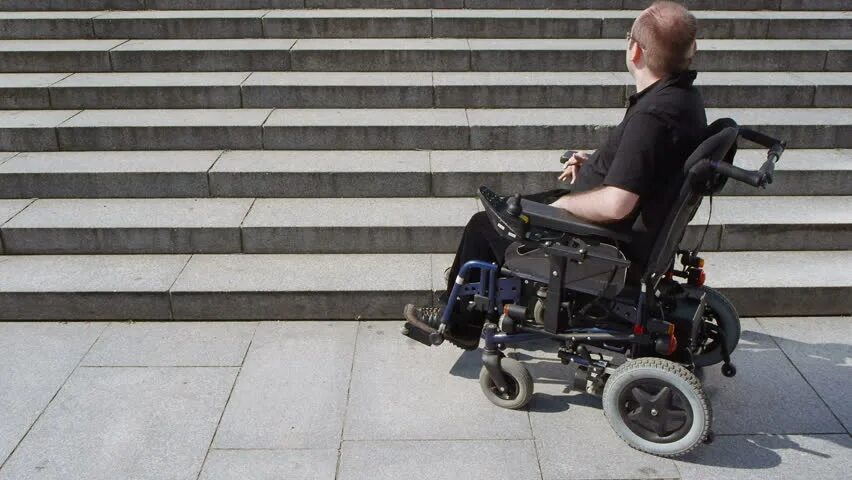 Disable true. Электрическая коляска для инвалидов. disabled person in a wheelchair. дети в инвалидной коляске казахстана. electric wheelchair.