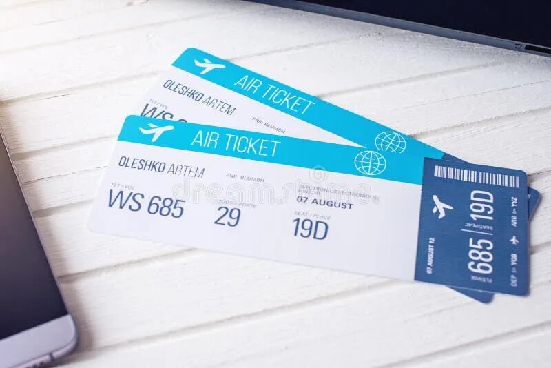 Book plane ticket. Авиабилеты на столе. Ticket фото.