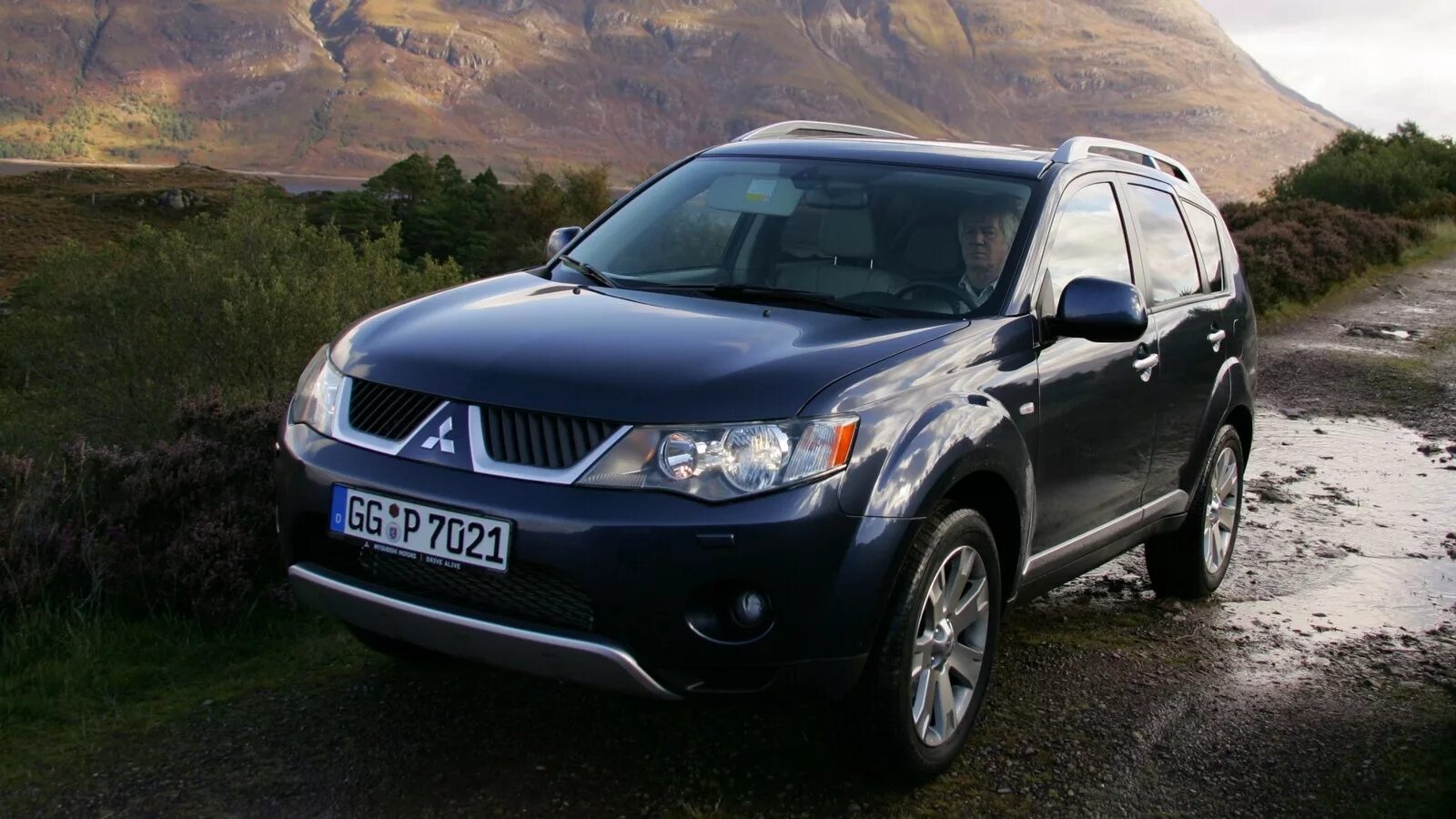 Авто мицубиши. Mitsubishi Outlander 2007. Митсубиши Аутлендер 2007. Mitsubishi Outlander XL 2007-2012. Mitsubishi Outlander XL 2007.