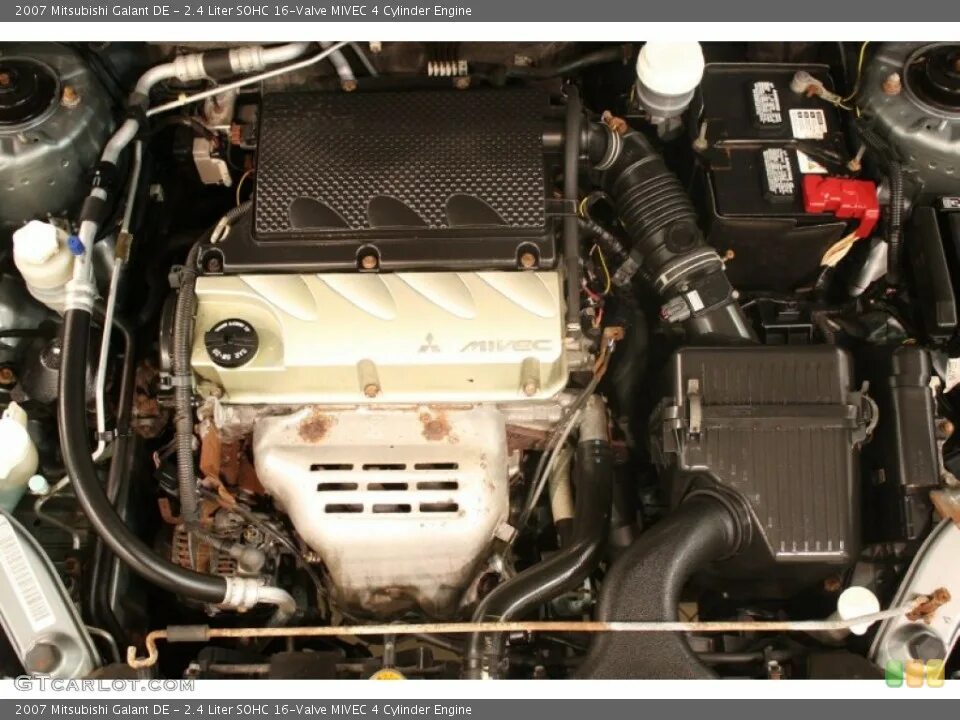 Двигатель мицубиси галант. Двигатель Мицубиси Галант 2.4. Мотор Мицубиси Галант 2.4 2007. Митсубиси Галант 8 2.4 мотор. Мотор Mitsubishi Galant 2007.