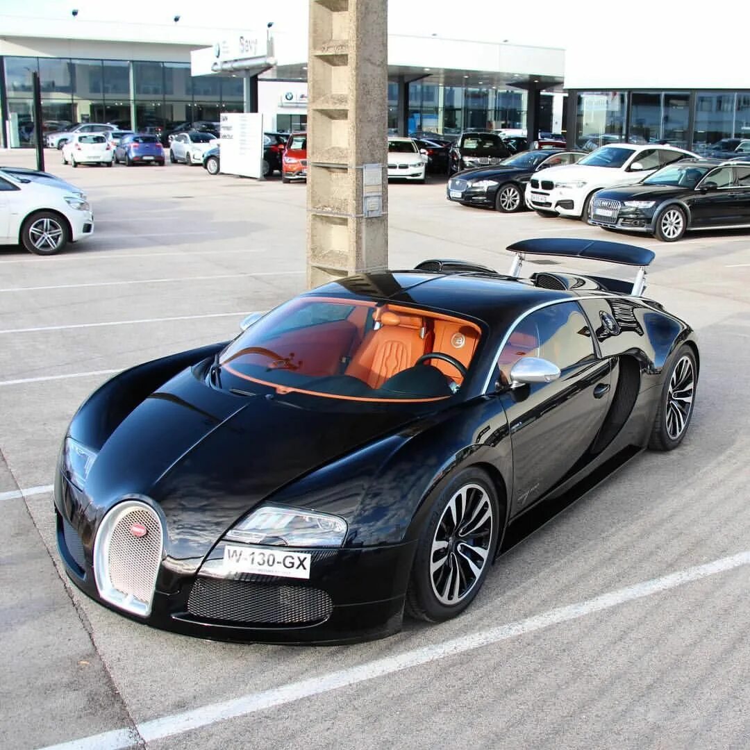 Сколько стоит автомобиль бугатти. Бугатти Вейрон 2001. Bugatti Veyron автомобили Bugatti. Электромобиль Бугатти Вейрон. Bugatti Veyron Sang Noir.