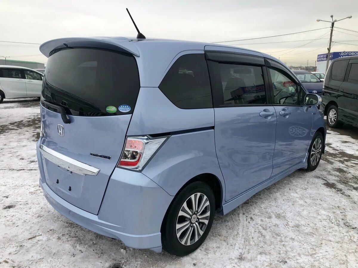 Хонда фрид робот. Honda freed 2013. хонда фрид 2013 гибрид. honda freed с709оа71. хонда фрид 2013 синяя.