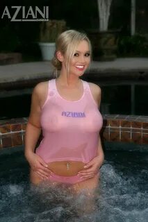 Hugely busty hot blonde Abbey Brooks shows off hard nipples in a wet t-shir...