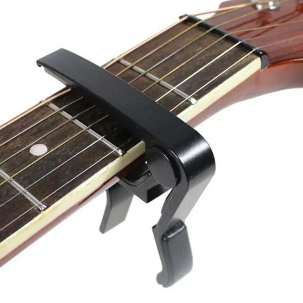 Каподастр паук для акустической гитары. Каподастр dunlop 83cb trigger. Каподастр для акустики и классики. Каподастр для акустической гитары на 6 струнной. Каподастр для бас гитары.