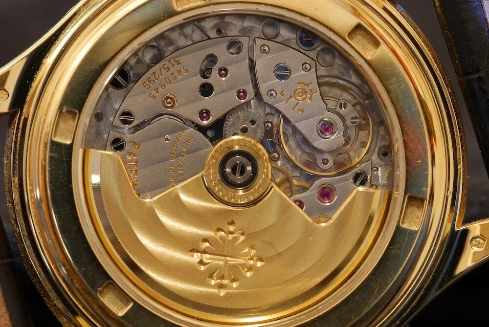 Часы позолоченном корпусе. Patek Philippe золотые. Patek Philippe 58152. Patek Philippe Geneve 750. Patek Philippe g488 18k 750.