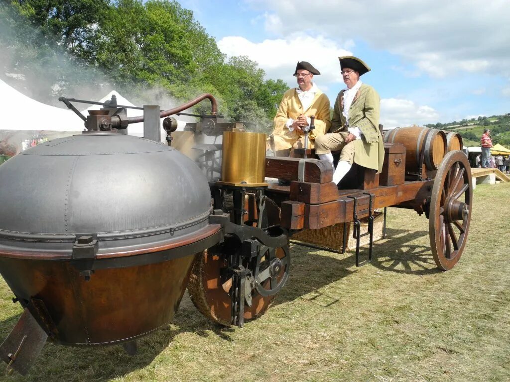 паровоз стефенсона 1825. первый паровой автомобиль 1803. первая в мире пара. первая машина в мире на паровом двигателе. машина на паровом двигателе.