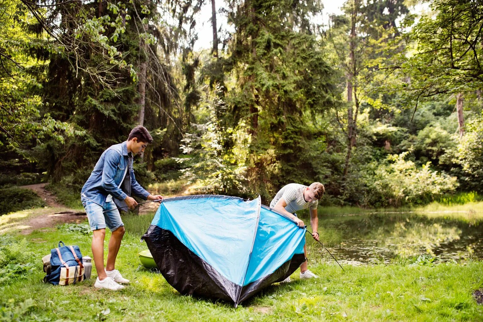 Pitching Tents. Pitched Tent. Палатка в лесу у озера. Set up a Tent.