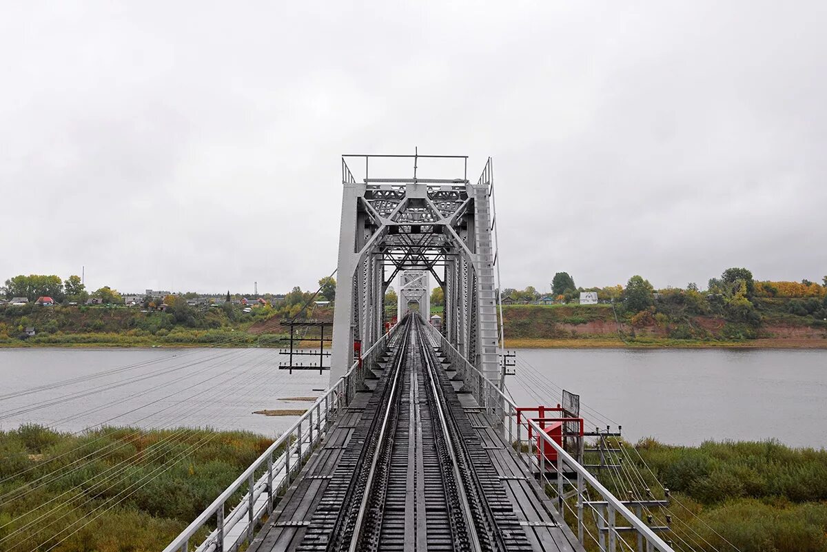 мост через северную двину в архангельске, разводной. железнодорожный мост котлас. архангельск мост через северную двину. северная двина жд мост архангельск. северная двина котлас мост.