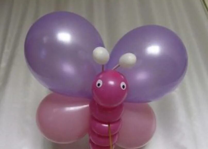 цветок из шариков круглых. цветы из круглых шаров. поделки из воздушных шариков. что можно сделать из шарика круглого. цветок из больших шаров.