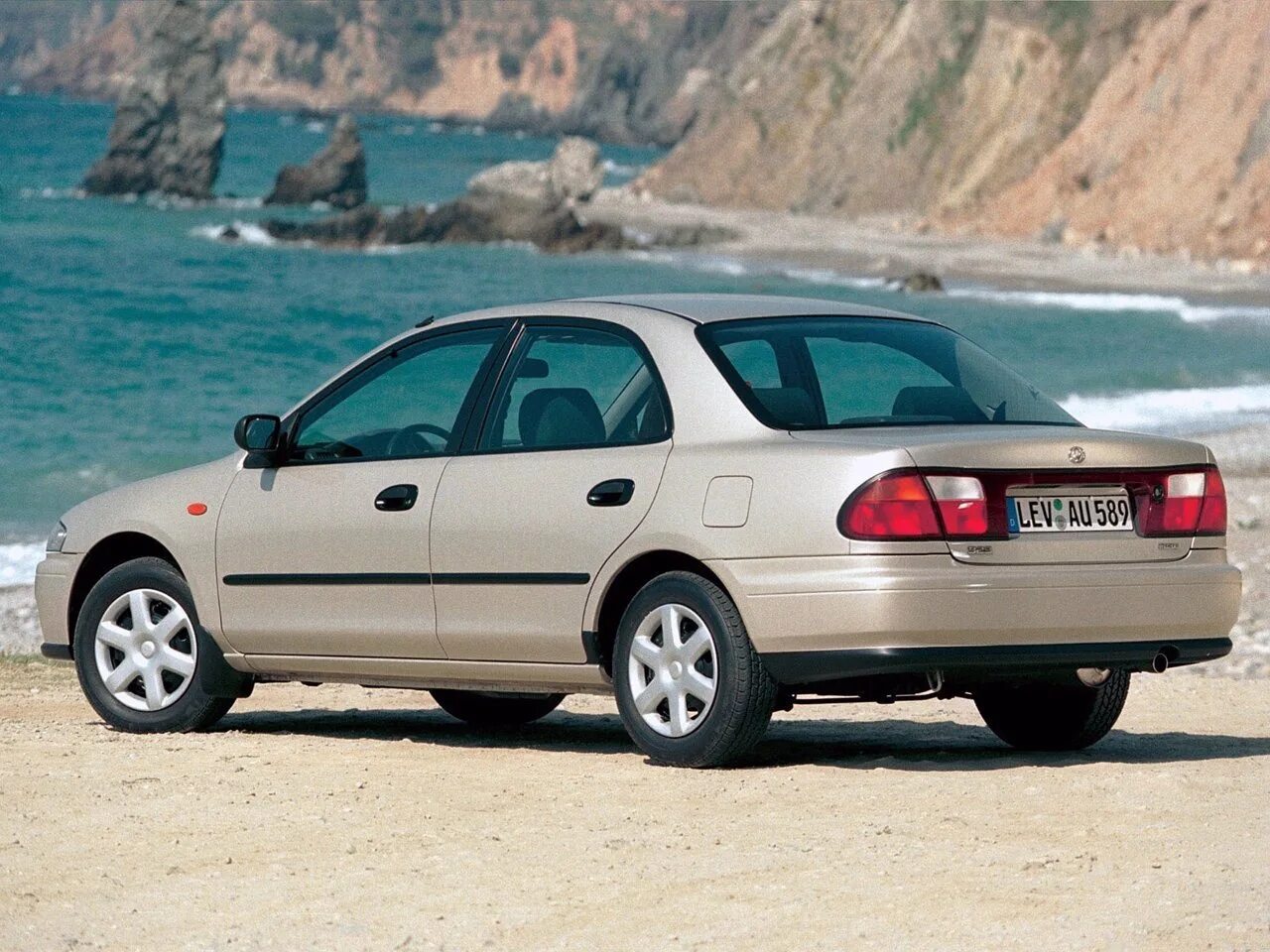 Мазда 323 s. Mazda 323 1998. 5 бензин. Mazda 323 vi (bj). 3.