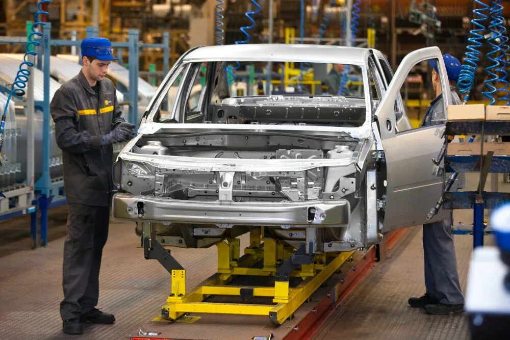 автомобильная промышленность. сборочный конвейер бмв м5. завод рено логан. производство автомобилей. изготовление автомобиля.
