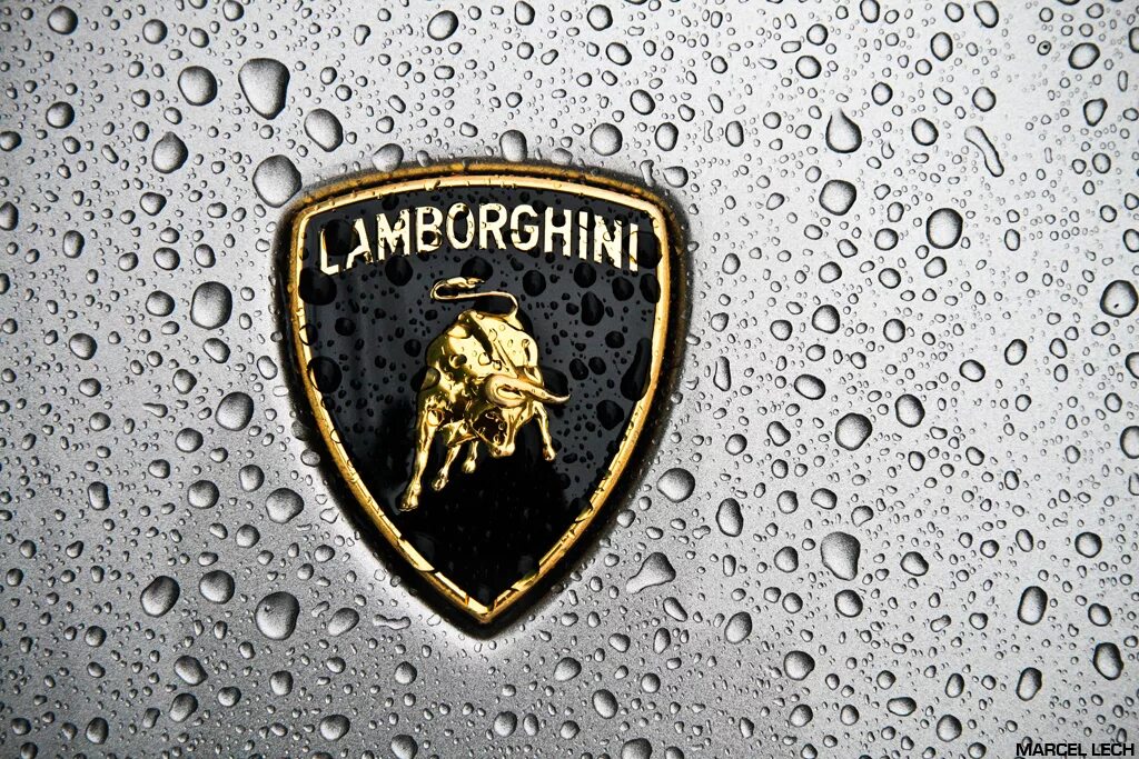 Новый значок ламборгини. Lamborghini значок. Марка Ламборджини. Ламборджини знак логотип. Lamborghini надпись.
