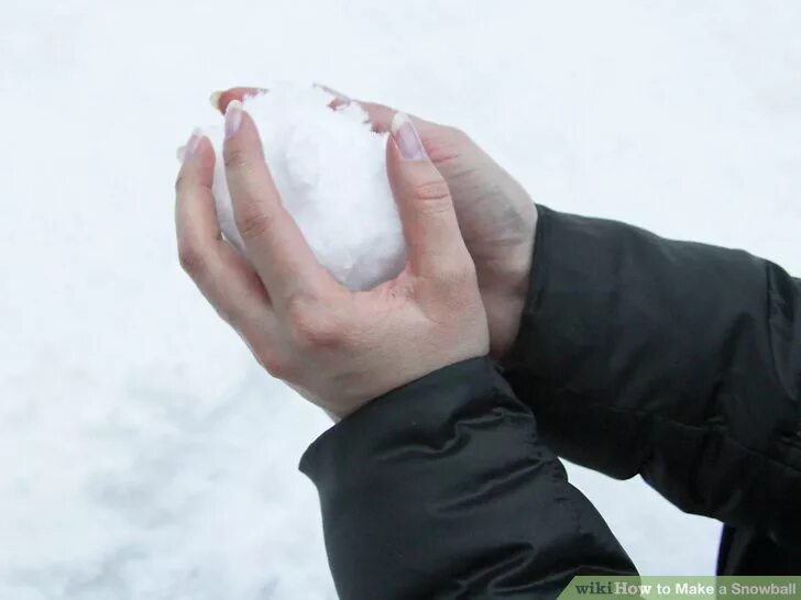Making snowballs. Make a snowball. делает снежок. making a snowball.