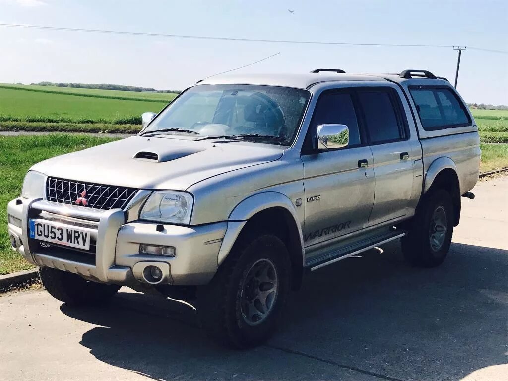 Митсубиси l200 2004. Митсубиси л200 2004. Mitsubishi l200 2004 года. Митсубиси l200 2000.