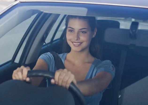 Melody in her car. She a car now