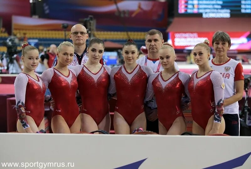 Спортивная гимнастика женская сборная. Женская сборная ангелина мельникова. тренер ангелины мельниковой. женская сборная по спортивной гимнастике. команда по спортивной гимнастике.