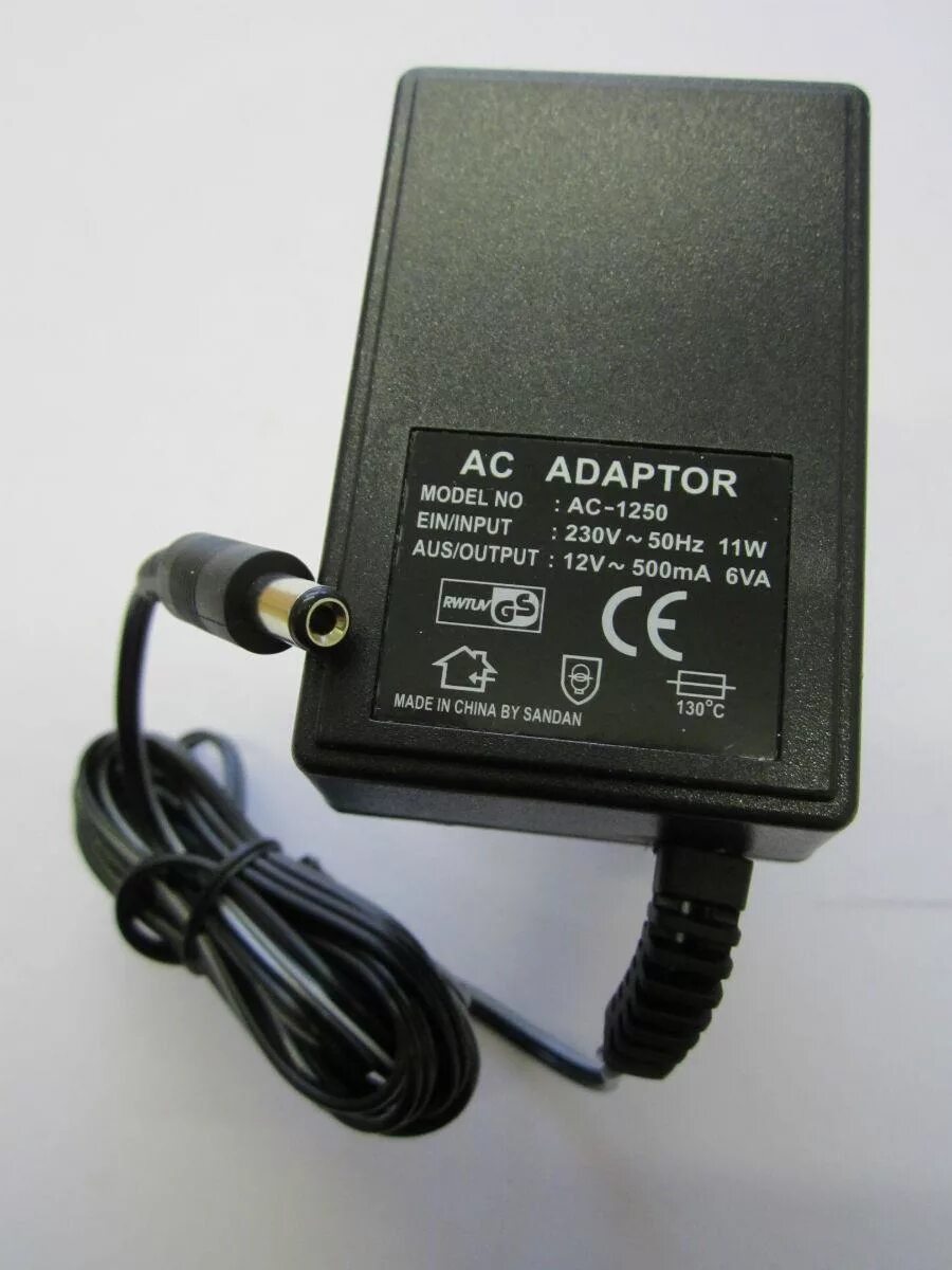 Ac ac адаптер 12v. AC AC адаптер 5v 500ma. Адаптер питания input 230v-50hz output 12v-500ma. АС/ДС Adaptor 12v 500ma 230v - 50hz. AC/FC Adaptor model:XT-122 12v 2000ma.