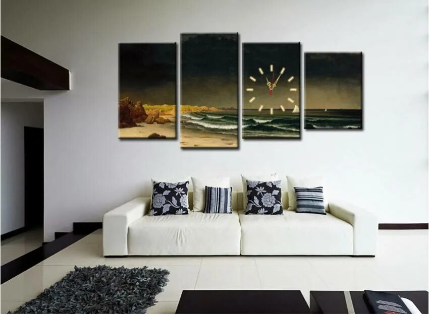Модульные картины над диваном в гостиной