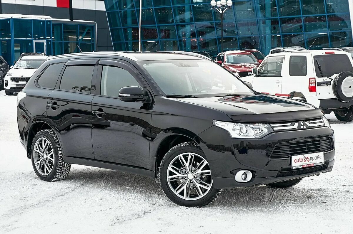 Мицубиси аутлендер 3 2012. Митсубиси Аутлендер 2012 черный. Mitsubishi Outlander 2012. Mitsubishi Outlander III 2012. Mitsubishi Outlander 2013 черный.