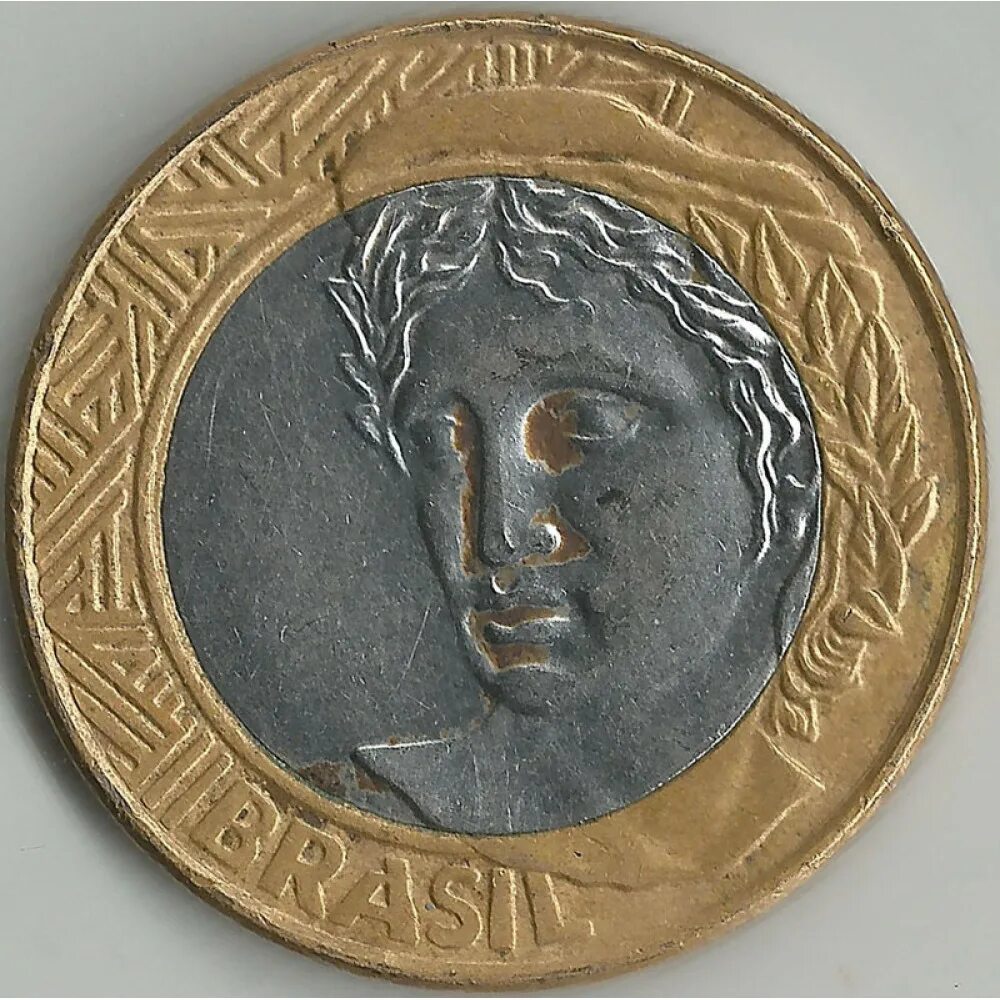 Один реал монета. 1 реал. Бразилия 1 реал 2003. Бразильский реал монета 25. Монета 1 реал бразилия.