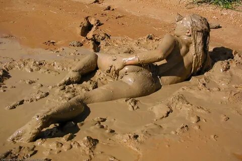 Nude Women In Mud.