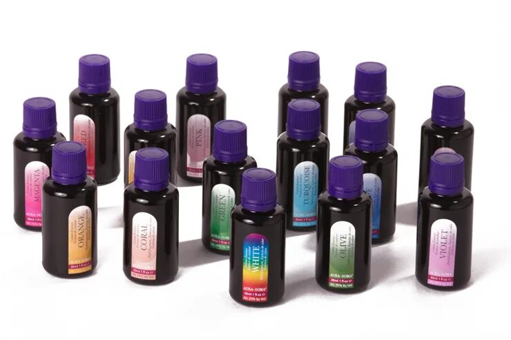 Эфирное масло лаванды. Ромашки маслом. Экстракты растений. Экстракты из растений. Масло в красивой бутылке.