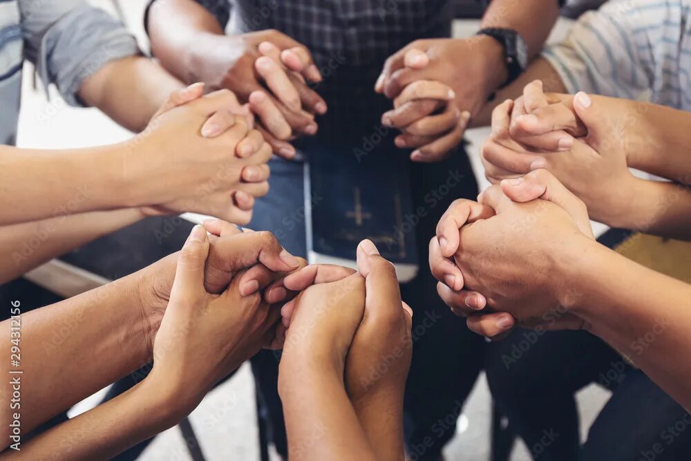Hands holding together