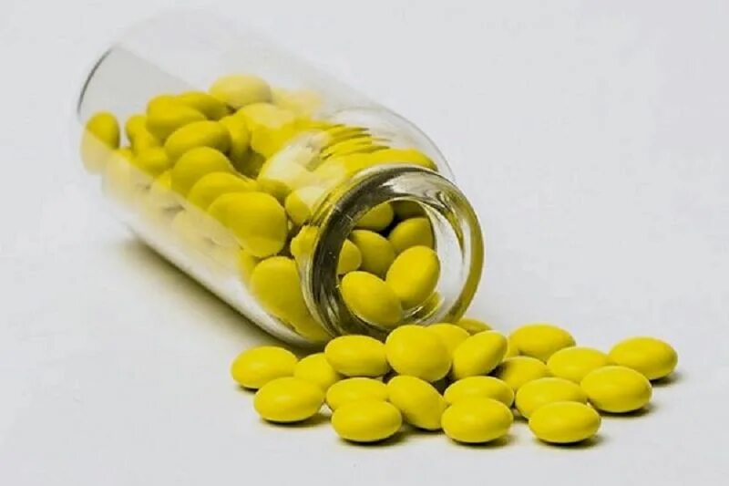 Валерьянка желтая. Желтые таблетки валерианы. Успокоительные таблетки желтые. Валерьянка в таблетках. Желтые маленькие таблетки успокоительные.