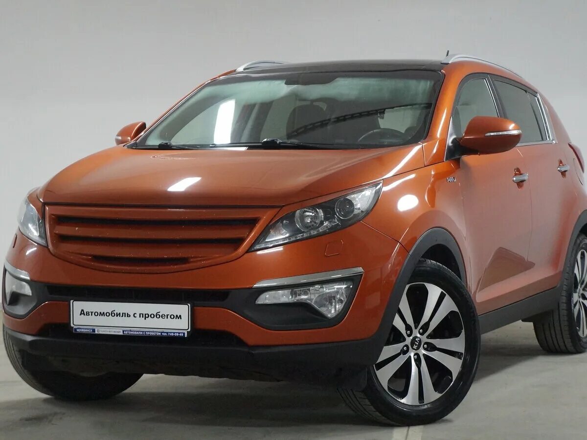 Купить киа спортаж бу. Kia Sportage 2010. Kia Sportage Orange 2010. Kia Sportage Делимобиль. Кия Спортейдж 3 оранжевая.