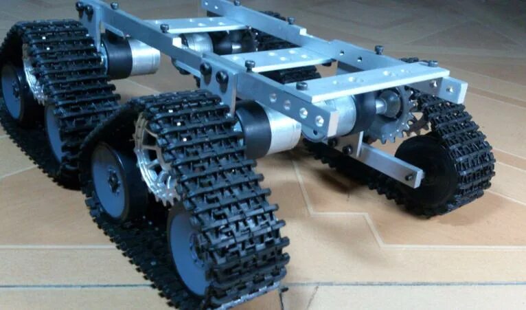 Шасси гусеница. Универсальное гусеничное шасси утс-140. гусеничный привод брайт s-32. колесно гусеничный движитель. планетоход гусеничный.