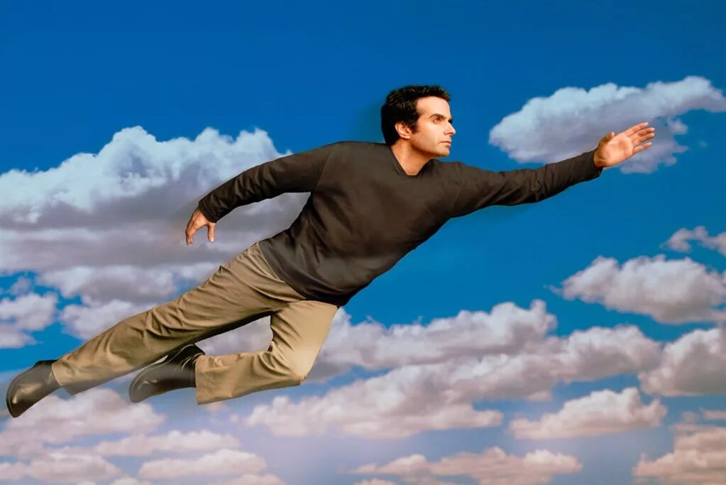 Дэвид Копперфильд. Дэвид Копперфильд (иллюзионист). Полёт Дэвида Копперфильда. Человек летает в воздухе.