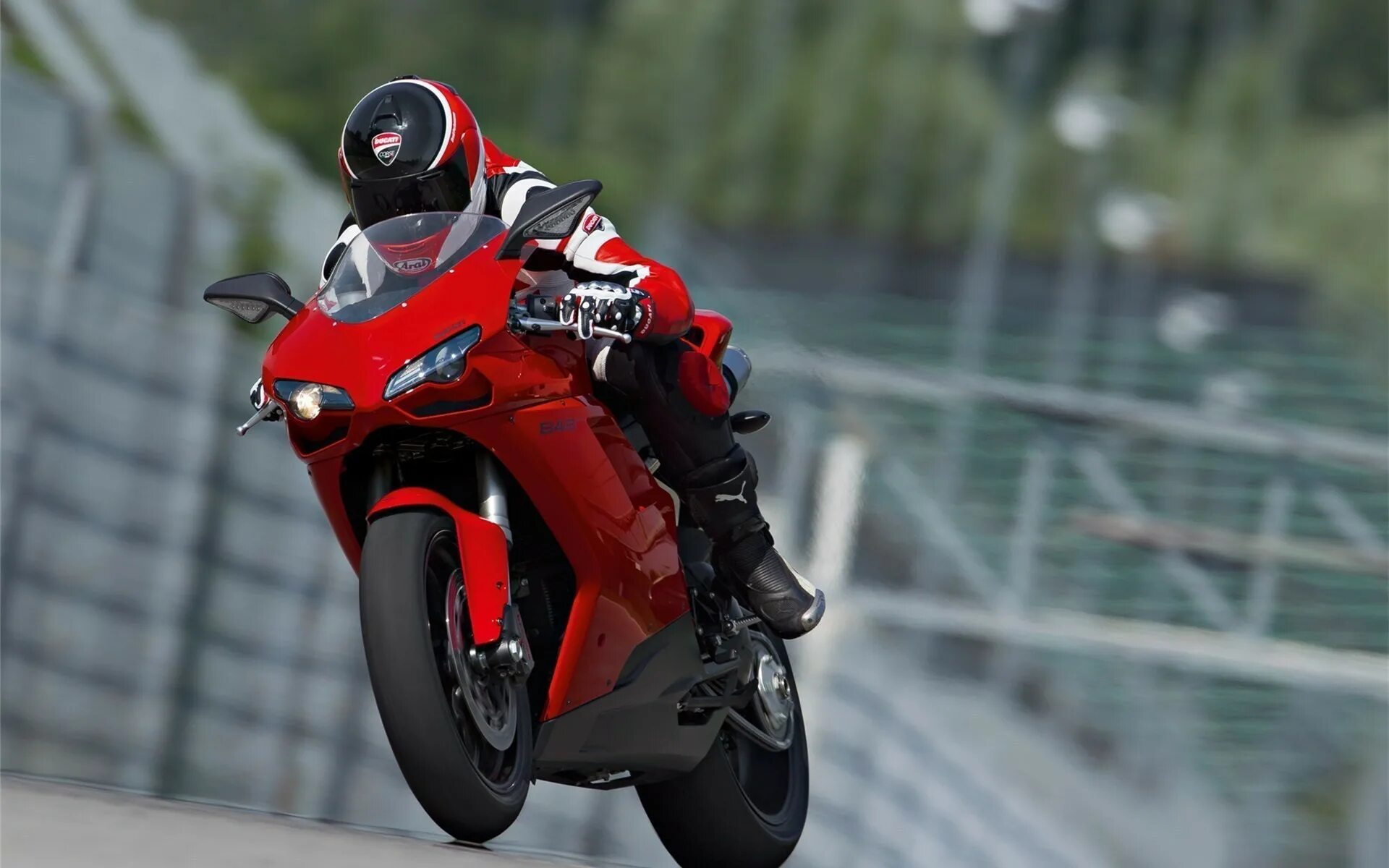 Мотоцикл б д. Ducati 848 EVO 2013. Мотоцикл Дукати 848 EVO. Дукати 848 мотоциклист. Ducati 848 2011.