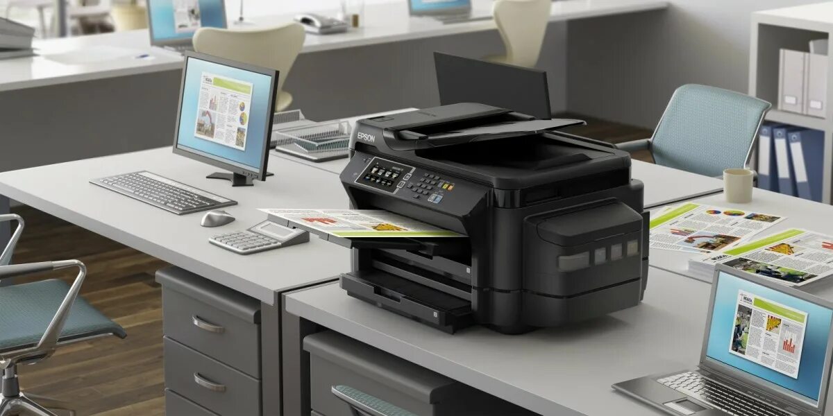 Мфу для офиса рейтинг. Epson l1455. Принтер для компьютера. Оргтехника для офиса. Принтер в офисе.