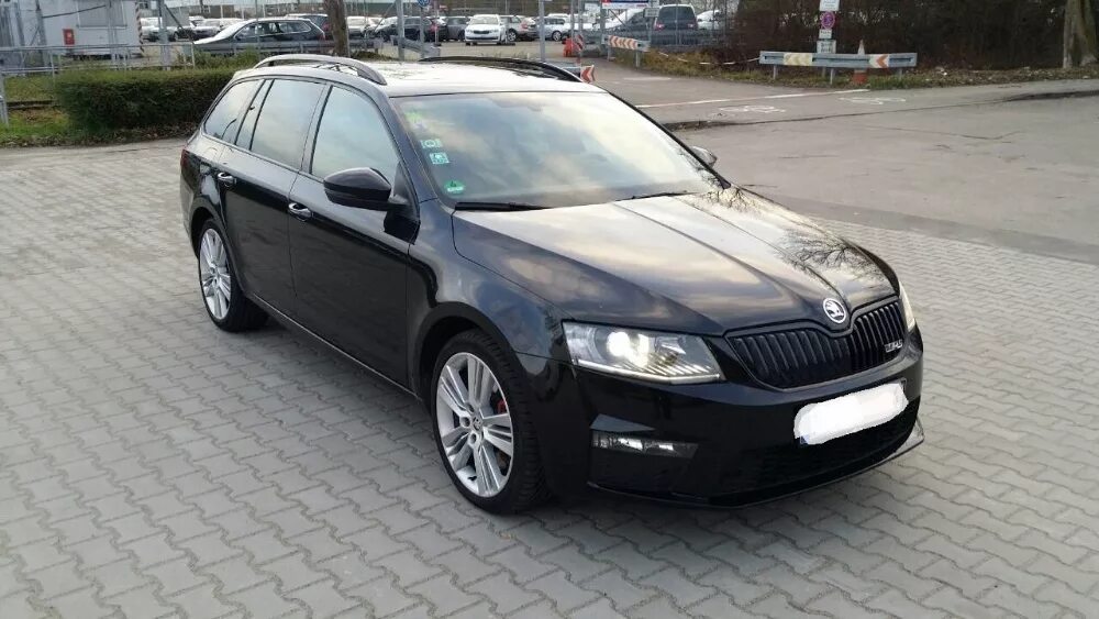 Skoda octavia rs 2.0 tdi. Шкода РС универсал черная. Шкода а7 универсал чёрная. Skoda Octavia 2014 универсал черная.