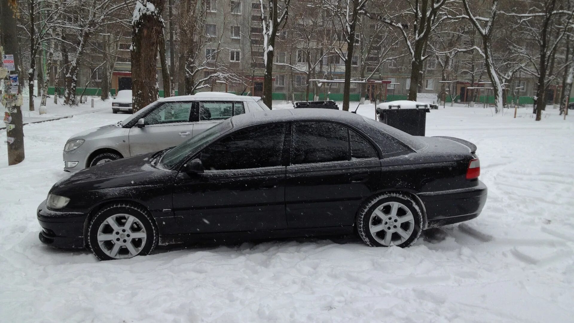 Ремонт опеля омега б. Opel Omega 2003 Tuning. Opel Omega b 2000 Black. Опель Омега б Рестайлинг черный. Опель Омега б тонированная.