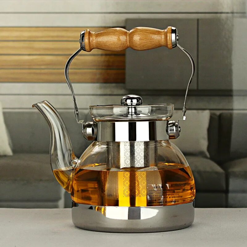 Какие стеклянные чайники лучше. Стеклянный чайник Teapot YF 6215. Заварочный чайник стеклянный plov Project. Чайник заварочный стеклянный с деревянной ручкой. Чайник стеклянный на деревянной подставке.