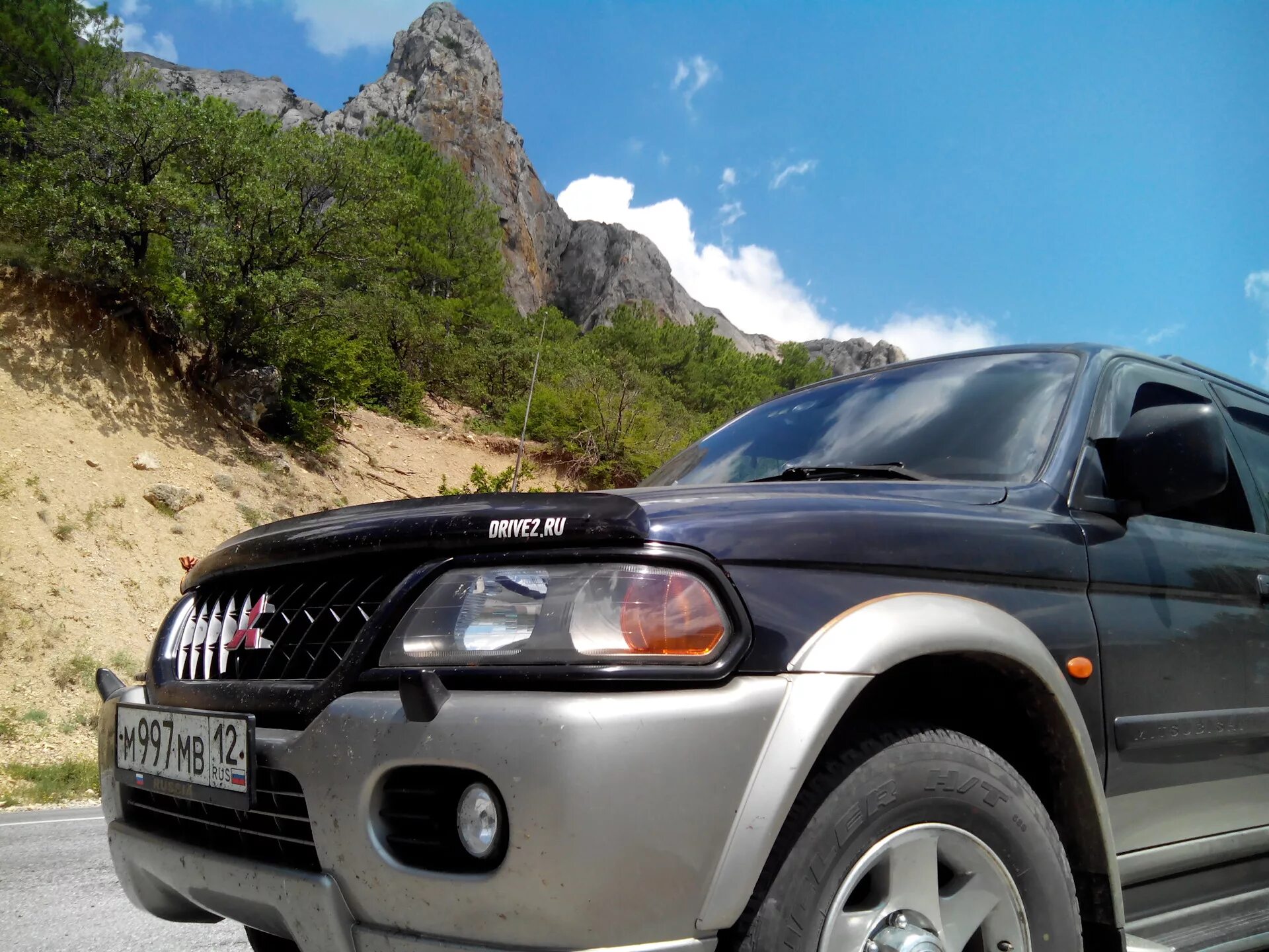 Мицубиси паджеро спорт москве. Pajero Sport 1. Мицубиси Паджеро спорт 1. Mitsubishi Pajero Sport 1 2005. Mitsubishi Pajero Sport 1 поколения.