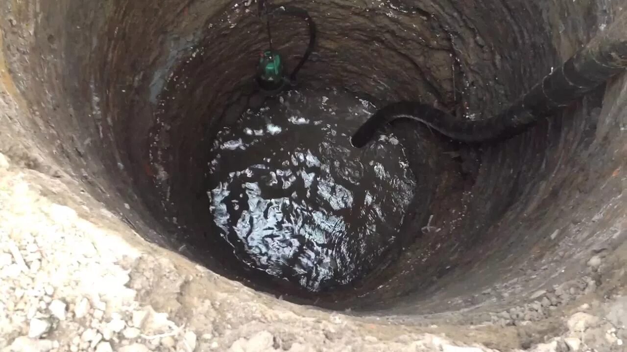 Как убрать воду из ямы