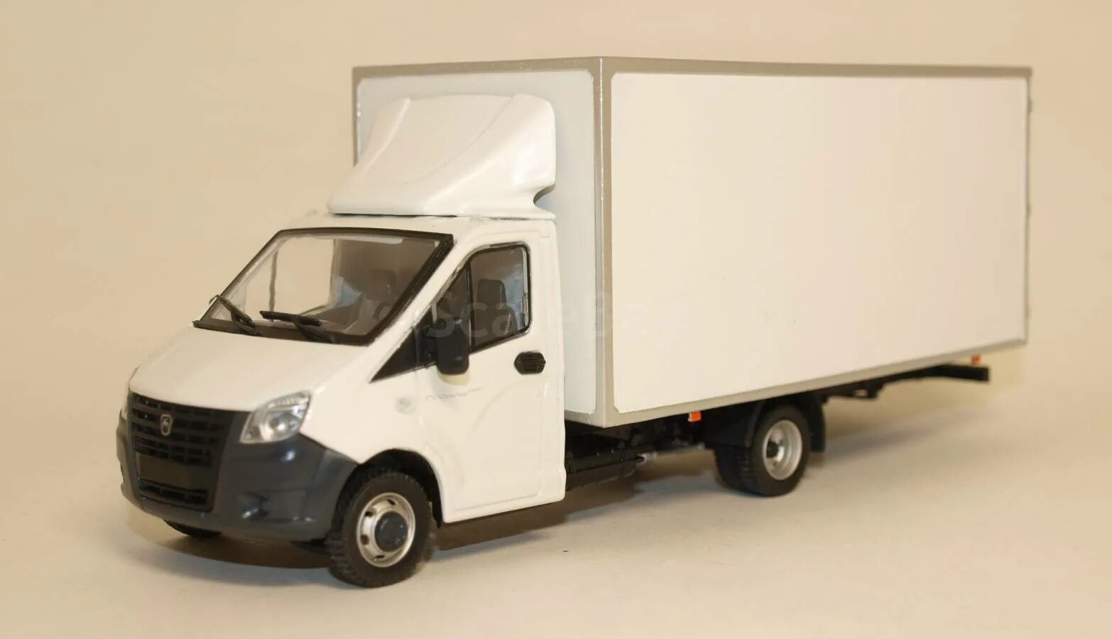 Газель next 1/43 фургон. Моделька газель некст. Газель некст масштабная модель 1. Газель некст 1 43 a22r. Модель газель некст 1 43.