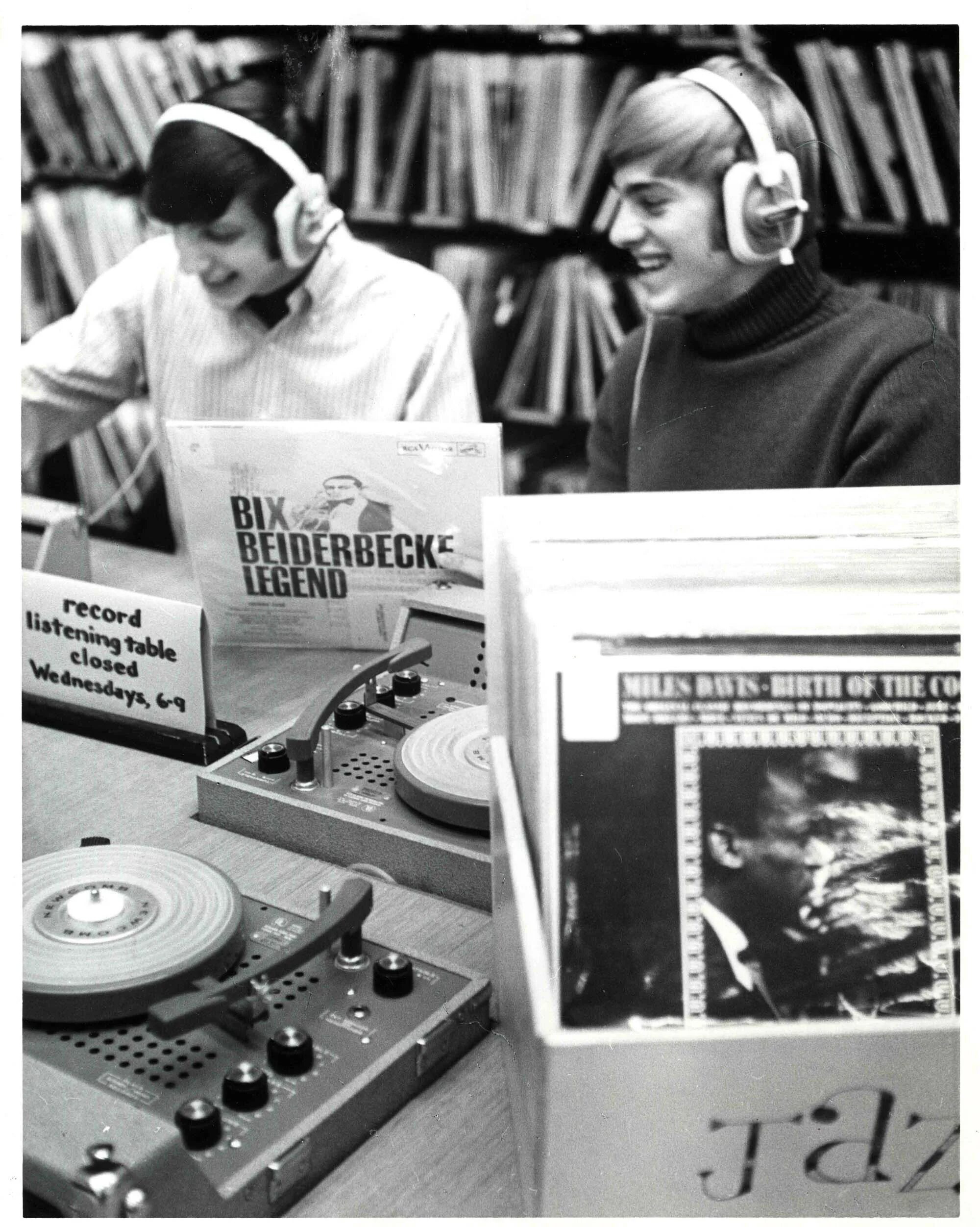 She listen to the radio. 1970s record. Motorola Radio Station 1970. Listening to Jazz on Vinyl records. Police Radio Station 1970.