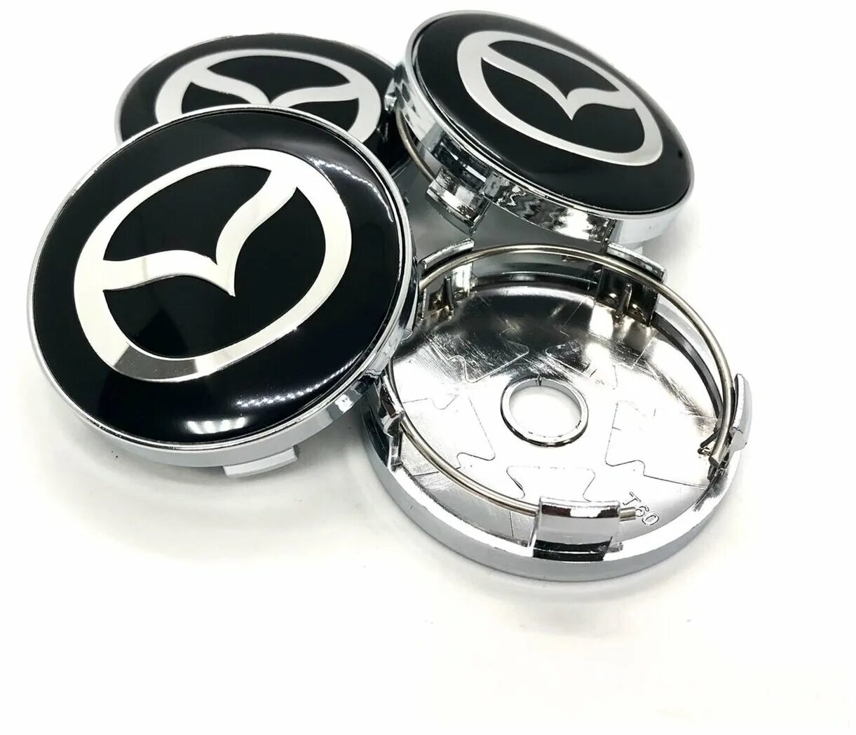Колпачки на диски мазда сх 7. Колпачок ступицы mazda 60mm. Колпачки дисков мазда. Наклейки на диски 65мм volkswagen. Колпак ступицы колеса mazda bbm237190.
