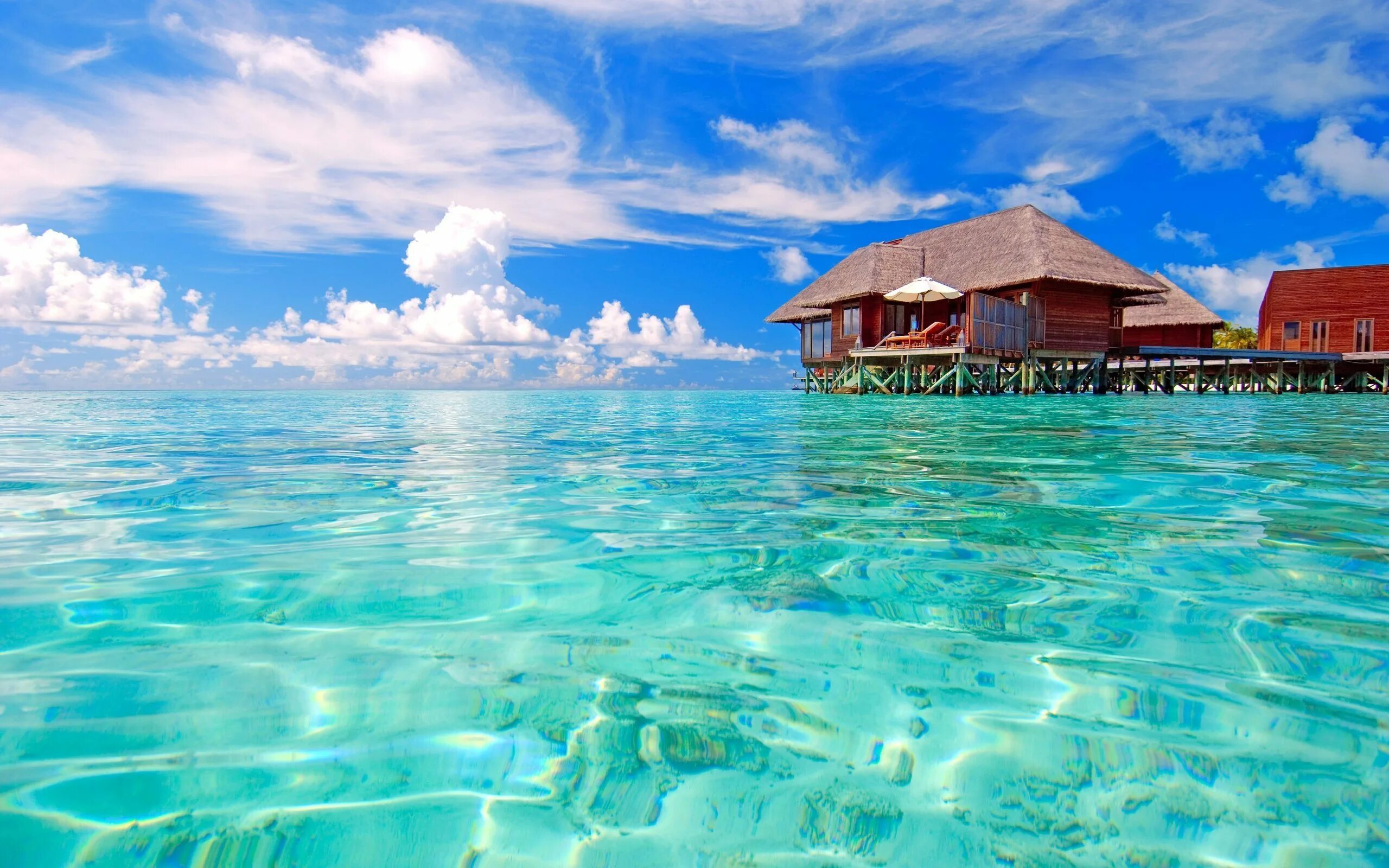 Красивые места у моря. Мальдивы Хитхадху. Мальдивы голубая Лагуна. Парадиз остров Карибского моря. Окинава бунгало.