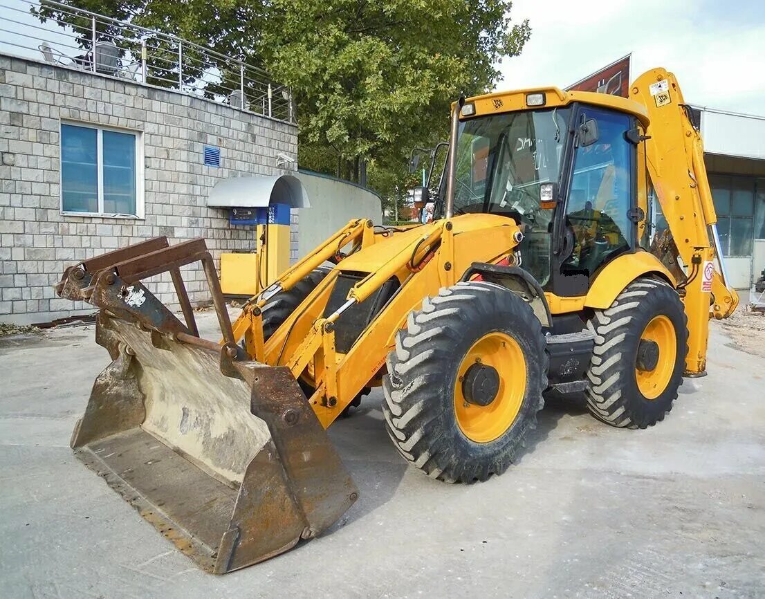 Купить jcb 3cx бу. Экскаватор JCB 4cx. Bull 4sx экскаватор-погрузчик. Погрузчики с разными ковшами. Bull 4sx экскаватор-погрузчик кабина.